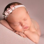 Newborn girl on pink. Charlotte Newborn Photographer