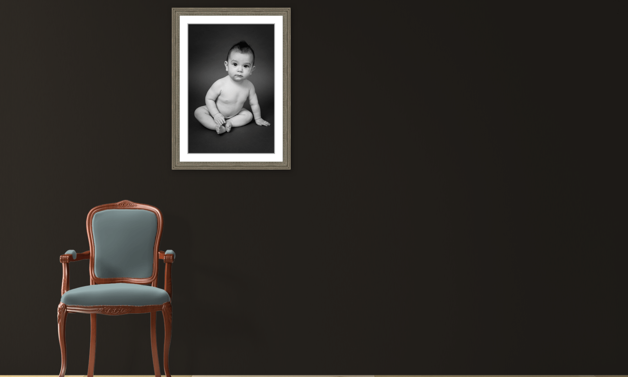 framed baby portrait sitting up boy black and white