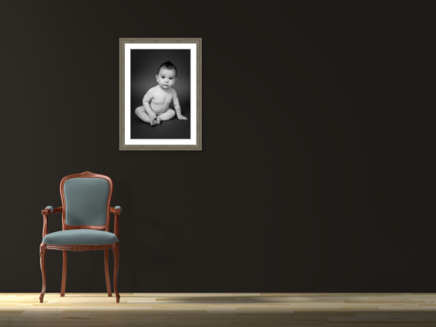 framed baby portrait sitting up boy black and white