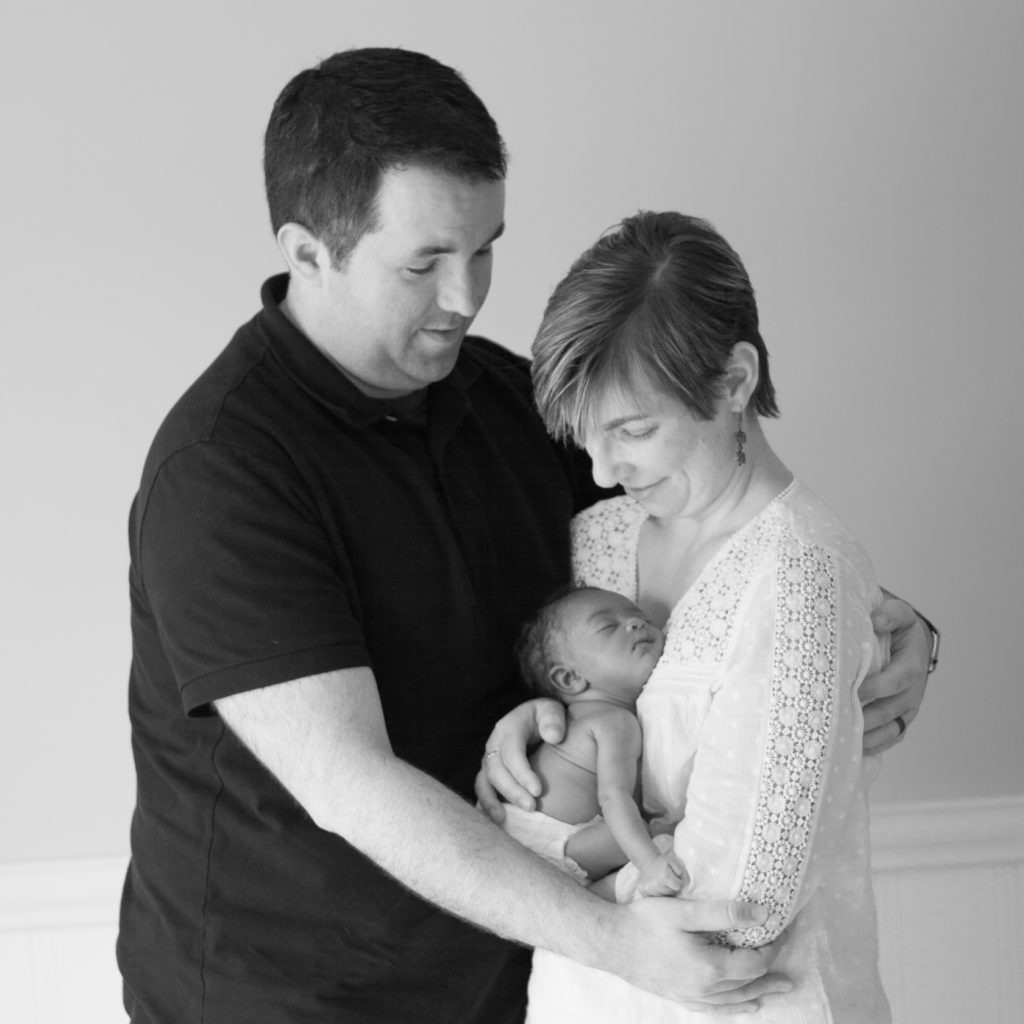 parents with newborn portrait