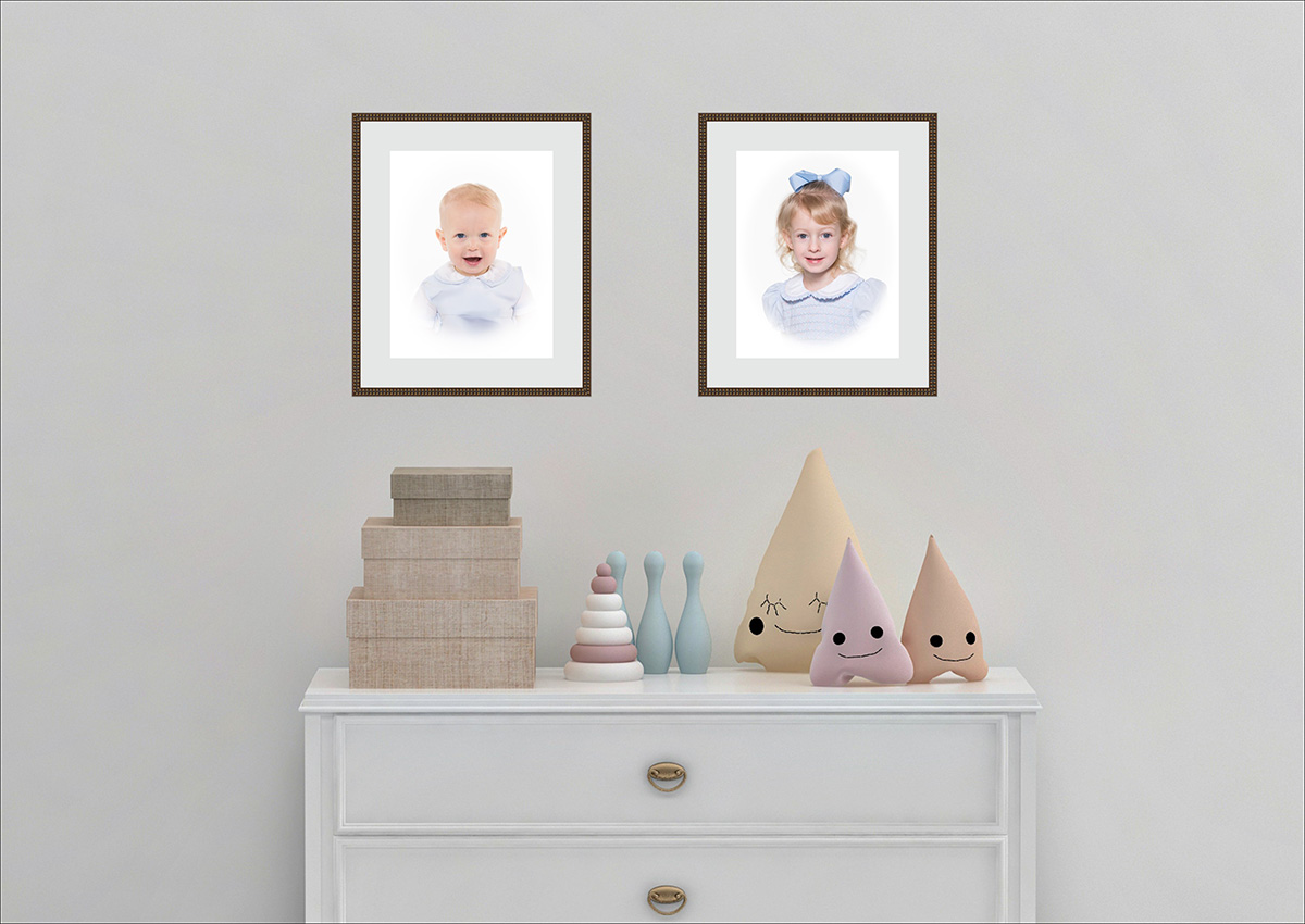 nursery wall with coordinating heirloom portraits one of each child in color wearing traditional southern clothing and bow in girl's hair
