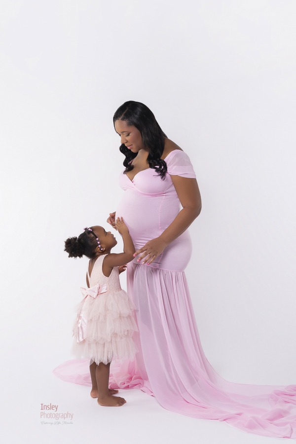 Celebrating Motherhood Maternity Project, black mother and daughter in pink