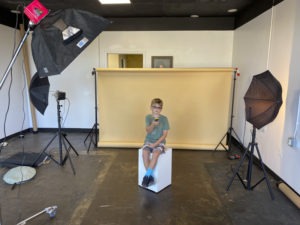 my baby helping me test out the lighting setup (reluctantly ;) at the Studio Off Main