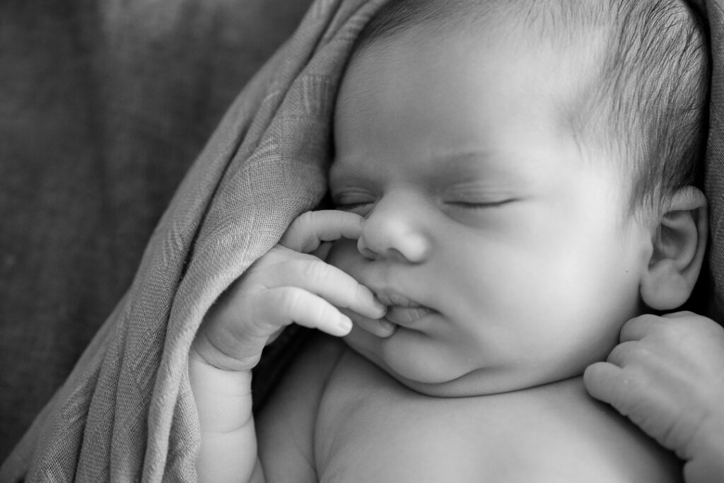 black and white close up of new baby taken by Insley Photography