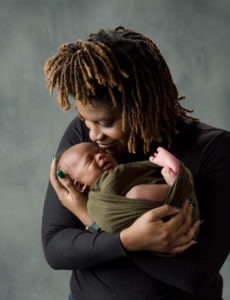 new mom with smiling newborn baby, Charlotte NC Indian land, SC