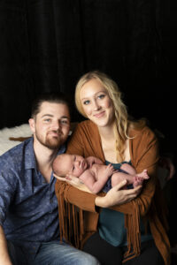 southwest style newborn portrait with parents